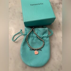 Tiffany & Co. Silver Bracelet with Pink Heart Charm